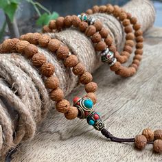 "This attractive and powerful Japa Mala is made with 108 Raktu seed beads that are hand stung in a nylon string with a fixed knot  📿Mala Beads, or Buddhist prayer beads, are a set of sacred rosary beads for chanting & counting mantras, meditation, prayer, yoga & reflection. Mala is a Sanskrit word meaning garland. The Tibetan word for mala is threngwa (Tibetan ཕྲེང་བ) . Seed malas are some of the most common malas used in Tibet and Nepal. Buddhist Prayer Beads are sometimes referred to as Japa Holistic Wooden Beaded Bracelets For Meditation, Spiritual Wooden Beads Mala For Festival, Traditional Mala With 108 Beads For Festival, Bohemian Mala With 108 Beads For Festivals, Bohemian Festival Mala With 108 Beads, Spiritual Beaded Bracelets For Rituals, Spiritual Wooden Beads Mala For Meditation, Spiritual Hand-strung Beaded Bracelets For Rituals, Spiritual Hand-strung Beaded Necklaces For Rituals