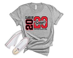 This is the perfect gift for the senior in your life. A great graduation shirt perfect for the class of 2023. Personalized with name and graduation year makes this a one-of-a-kind gift. Our Bella Tees are like finding a treasure at the end of a rainbow. Our shirts are super soft and become softer with each wash! They are made using high quality grade heat transfer vinyl and a professional heat pressed for an extremely soft feel. Our Graphic Tees are longer length making a great addition to any w Senior 2023, Graduation Shirt, Senior High School, Graduation Year, Senior Gifts, Class Of 2023, School Tees, Graduation Shirts, High School Seniors