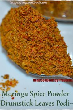 a spoon full of spices sitting on top of a white plate with the words morning spice powder drumstick leaves podi