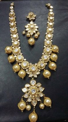 22k Gold South Sea Pearl Jadau Necklace set, diamond polki necklace Earring set, three piece jadau set 22k Gold approx 80-100 gms Diamond Polki 16-20 carats South Sea Pearls 150-180 carats Clip and pearl wire 18 kt gold Kundan Yellow Gold Jewelry For Diwali, Diwali Kundan Yellow Gold Jewelry, Yellow Gold Kundan Necklace For Diwali, 22k Yellow Gold Chandbali Kundan Necklace, 22k Gold Jewelry With Cutdana, Kundan Chandbali Necklace In Yellow Gold, Hand Set Yellow Gold Kundan Necklace Chandbali, Yellow Gold Kundan Chandbali Necklace, Hand Set Gold Plated Kundan Necklace For Festivals