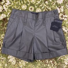 Pretty And Sophisticated These Cotton And Nylon Shorts In Grey. Side Zip And Button Closure, They Have A Nice Sheen To Them. Laying Flat- Approx Length From Top To Bottom Of Cuffed Hem - 14” Width At Waist - 14.5” Size- 2 Elegant High-waisted Shorts With Button Closure, Elegant High Waist Shorts With Button Closure, Elegant Short Bottoms With Button Closure, Chic Fitted Shorts With Button Closure, Fitted Summer Pants With Button Cuffs, Chic Pants With Button Closure, Chic Short Length Pants With Button Closure, Elegant Summer Bottoms With Button Closure, Chic Bottoms With Button Cuffs And Short Length