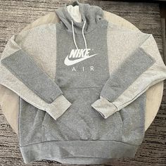 New Nike Air Get Over Your Fear Of Heights Hoodie Size L Grey Hooded Sweatshirt This Nike Air Hoodie In Size L Is Perfect For Any Sports Enthusiast Or Casual Wearer. The Drawstring Closure, Long Sleeves, And Round Neckline Provide A Comfortable Fit For Any Body Type. The Cotton Material Is Soft And Easy To Maintain With Machine Washable Garment Care. The Gray Color And Nike Logo Accent Add A Classic Touch To Any Outfit. The Pullover Style And Hooded Feature Make It Suitable For Any Outdoor Activ Heather Grey Hooded Sweatshirt With Adjustable Hood, Nike Urban Hooded Sweatshirt, Nike Urban Sweatshirt With Kangaroo Pocket, Nike Casual Outdoor Hoodie, Nike Urban Hoodie With Kangaroo Pocket, Nike Hooded Sweatshirt For Streetwear, Nike Hooded Hoodie For Streetwear, Nike Urban Hoodie With Ribbed Cuffs, Nike Urban Sweatshirt With Double-lined Hood