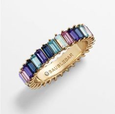 Rainbow sapphire ruby eternity band ring 14K gold | Natural emerald cut rainbow ring gold | Rainbow ombre ring gold | 5 x 3MM Emerald cut ring STONE DETAILS: ✦ Gemstone : Rainbow Sapphire, Ruby, Amethyst, Tanzanite, Topaz, Tourmaline, Peridot ✦ Gemstone Type: Natural ✦ Gemstone Size : 5 x 3 mm ✦ Gemstone Shape: Emerald cut / Octagon cut ✦ Number of gemstones: 21 ✦ Gemstone Weight: 7-8 carats ✦ Gemstone Grade: AAA METAL DETAILS: ✦ Metal : 14K/18K Gold ✦ Metal Color: Yellow/White/Rose Gold ✦ Setting: Prong Setting ✦ Ring Box: Yes SHIPPING DETAILS: ✦ Shipped via : USPS ✦ Production time: 10-12 days ✦ Delivery time: 7-8 days ✦ Expedited shipping : Available ✦ Expedited shipping service: UPS ✦ Expedited shipping time: 5 days ✦ Expedited shipping cost: 70$ CUSTOMIZATION DETAILS : We can customiz Modern Multi-stone Emerald Cut Jewelry, Fine Jewelry With Multicolor Emerald Cut, Rainbow Baguette Cut Jewelry Gift, Ruby Eternity Band, Ombre Rings, Emerald Cut Ring, Rainbow Ring, Rainbow Ombre, Rainbow Sapphires