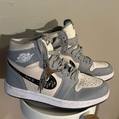 Dior X Air Jordan Shoes Size 6.5 See Pictures For Condition Some Light Scuffing On Toe Luxury High-top Jordan Sports Shoes, Designer High-top Jordan Shoes With Branded Insole, Luxury Jordan Lace-up Sports Shoes, Luxury High-top Jordan Shoes, Luxury Lace-up Jordan Sports Shoes, Designer Low-top Jordan Shoes, Air Jordan Shoes, Dior Shoes, Jordan Shoes