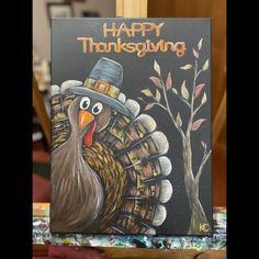 a happy thanksgiving card with a turkey wearing a hat