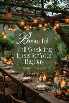 an outdoor dining table with candles and lights hanging from the branches above it, surrounded by greenery