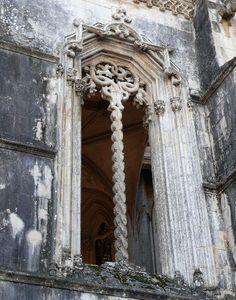 an old building with ornate carvings on it