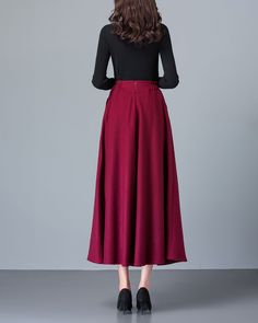 * A high-end long wool skirt with wide hem, very cool. * Made of wool blends, fully lined and with two side pockets. * Fixed waist on front, partial elastic waist on back and side invisible zipper. * Can custom make waist size and skirt length. * Material: Outer-50% wool, 50% polyester; lining-100% polyester * Washing instructions: Dry Clean Only * Size: True to US size, US 0-US 20 are available, you can let us know your usual size and height in your order. * Shipping: Free shipping Processing t Winter Wide Leg Skirt With Pockets, Winter Full Maxi Skirt With Pockets, Wool Pleated Long Skirt, Fall Wide-leg Lined Skirt, Fall Wide Leg Lined Skirt, Long Wool Pleated Skirt, Fall Wide Leg Lined Maxi Skirt, Fall Maxi Skirt With Pockets, Burgundy Skirt For Fall