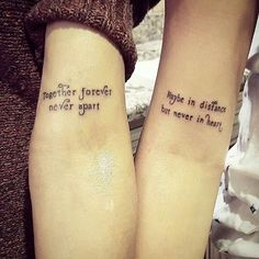 two people with matching tattoos on their arms that say together forever and never in heart