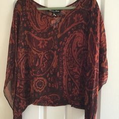 Nwt Winter Kate Paisley Top. Burnt Orange Color, Paisley Pattern. Sheer Silk Material. Flutter Sleeves, Pull-On. Perfect Color For Autumn. Never Worn, And In Perfect Condition With No Marks Or Defects. Maybe Slightly Wrinkled From Storage. Length 19" Size Medium. Comes From A Smoke/Animal Free Home. Selling For 75% Off Retail Price. Home Selling, Paisley Top, Burnt Orange Color, Silk Material, Paisley Pattern, Flutter Sleeves, Winter Women, Burnt Orange, Orange Color