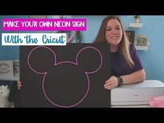 a woman holding up a sign that says make your own neon sign with the cricut