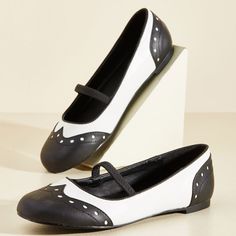 Step into timeless elegance with these black and white vintage flats. Featuring a round toe and wingtip-inspired design, these vintage flats effortlessly blend classic charm with modern comfort. Color: Black and white Toe: Round toe Slip-on style Vintage wingtip-inspired design Elastic band design Handcrafted US sizing. Fits true to size. Heels Winter, Black Ballet Shoes, Black And White Flats, Oxford Shoes Outfit, Black Oxford Shoes, Wingtip Shoes, Velvet Flats, Black Flats Shoes, Vintage Flats