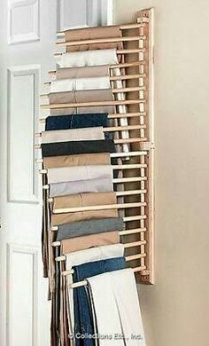 a rack with pants hanging from it's sides