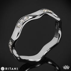 a white gold ring with diamonds on it