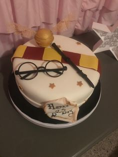 a harry potter themed birthday cake on a table