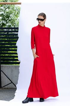 "Red Maxi Dress, Comfortable Dress, Minimalist Dress in Red 🍒 This red maxi dress with sleeves is the absolute MUST HAVE dress! Cut from stretchy viscose, this maxi dress feels like a second skin. Wear your long maxi dress with sneakers, ballerinas, elegant high heels, with moto boots and moto jacket. Accessorize your beautiful long dress with pearls or big earrings! 🍒 Please take a look at our size chart to ensure perfect fit https://www.etsy.com/listing/265083605/ . THE MODEL OF THE PICTURES Festive Red Midi Length Dress, Red Midi Dress For Festive Occasions, Red Long Sleeve Midi Dress For Evening, Festive Red Long Sleeve Maxi Dress, Elegant Solid Color Dress For Holiday, Festive Red Midi Dress, Festive Red Embroidered Maxi Dress, Elegant Dress For Holiday, Elegant Dresses For Holiday