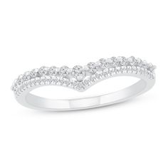 a white gold wedding band with diamonds