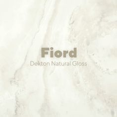 a white marble wall with the words fiord written in grey on it's side