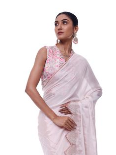 Look like a royalty in this exquisite powder pink chiffon saree at weddings and special occasions. It has an embroidered scalloped border and comes with a beautiful embroidered blouse. Wedding Georgette Blouse With Embroidered Border, Pink Georgette Pre-draped Saree With Embroidered Border, Bollywood-style Georgette Blouse With Embroidered Border, Bollywood Style Georgette Blouse With Embroidered Border, Reception Saree With Embroidered Border In Pink, Feminine Festive Wedding Blouse, Designer Georgette Blouse With Embroidered Border, Festive Georgette Blouse With Embroidered Border, Elegant Pink Pre-draped Saree With Chikankari Embroidery