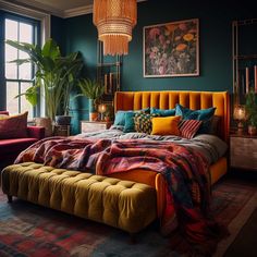 a large bed sitting next to a window in a room with green walls and furniture