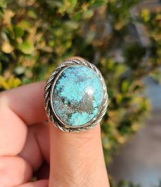 This fabulous handmade sterling silver ring was made with sterling silver, hand stamped and features a stunning Turquoise Cabochon. This is truly a statement ring. Dimensions: Length - 1 1/16 in. (26 mm) Width - 1 in. (26 mm) Size: 9 1/2 Weight: oz. - 0.52 g. - 15 Shipping and Packaging This is a 'ready to ship' item so please enjoy shipment within one day! All purchases come in a beautiful box and packaged securely and with insurance per USPS so they will arrive safely. International shipping a Spiritual Sterling Silver Turquoise Ring With Large Stone, Oval Chrysocolla Jewelry With Patina, Southwestern Silver Turquoise Ring For Jewelry Making, Artisan Turquoise Ring With Chrysocolla, Silver Southwestern Turquoise Ring Gift, Southwestern Silver Turquoise Ring Gift, Southwestern Style Silver Turquoise Ring As Gift, Silver Southwestern Style Turquoise Ring As Gift, Southwestern Style Silver Turquoise Ring For Gift