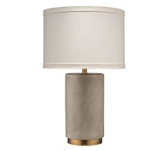 a table lamp with a white shade on it