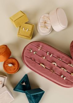 several different types of jewelry laying next to each other