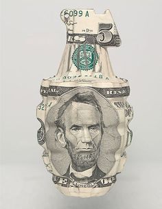 a one dollar bill with the image of abraham lincoln on it's back side