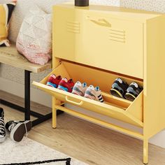 two pairs of shoes are sitting in a yellow shoe rack next to a table with a lamp