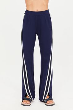 Free ground shipping on orders $195+ & free returns on The Upside Petra Flare Pant in Navy at BANDIER. Shop new arrivals at Bandier.com. Full Length Pants With Side Stripes, Sporty Pants With Contrast Trim, Active Sets, Flare Pant, Nike Accessories, The Upside, Nike React, Women's Activewear, Tech Fleece