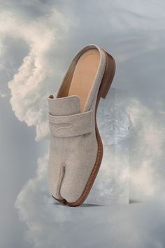 Luxury Slip-on Mules For Spring, Luxury Spring Mules With Rubber Sole, Designer Slip-on Mules For Spring, Designer Single Toe Strap Mules For Spring, Designer Spring Mules With Leather Sole, Designer Slip-on Mules With Rubber Sole, Designer Slip-on Mules With Closed Toe, Japanese Socks, Maison Margiela Tabi