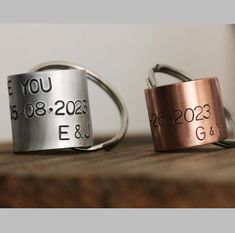 two rings that say if you were born in december and e & g are on top of each other