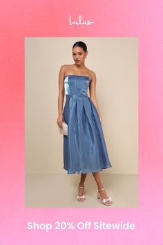 a woman in a blue dress with the words shop 20 % off site