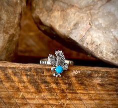 This captivating Sleeping Beauty Eagle Ring features a round sleeping beauty turquoise stone, symbolizing protection and positive energy. The eagle, a powerful and respected animal in Native American culture, adds a touch of spiritual significance to this stunning piece. Sleeping beauty eagle ring. Sizes 5,6,7,8,9,10,11,12. If half sizes or sizes over size 10 are needed leave it in the comments. Adjustable Spiritual Turquoise Ring, Spiritual Turquoise Healing Ring, Spiritual Healing Turquoise Ring, Original Sleeping Beauty, Eagle Ring, American Culture, The Eagle, Native American Culture, Sleeping Beauty Turquoise