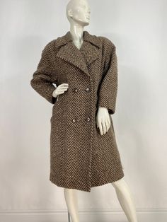 "1980s Jacob Crowley coat, union label coat, oversized fit, shoulder pads, size 8 Measurements:  Shoulder (shoulder pads)20\"/sleeve 20\"/bust (pit-pit)23\"/waist 23\"/length 39\" Mannequin measurements:  5'8\", bust 34\", waist 25\", hip 33\" Please note that vintage clothing sizes can vary greatly.  The Measurements provided  are approximate and are taken lying flat.  I suggest taking a similar garment from your wardrobe and measure it while lying flat.  This way you can compare measurements. Vintage Double-breasted Outerwear For Fall, Fall Vintage Fashion Single-breasted Outerwear, Retro Formal Winter Outerwear, Retro Fall Outerwear For Vintage Fashion, Brown Vintage Outerwear For Fall, Brown Outerwear For Fall Vintage Fashion, Brown Vintage Fashion Outerwear For Fall, Vintage Double-breasted Outerwear, Vintage Outerwear For Fall