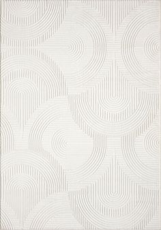 a white rug with wavy lines on it