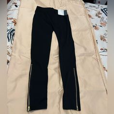 These Cozy Fleece Lined Leggings, Will Look Great Underneath A Dress Or Tunic Top. The Gold Zipper Bottoms Will Add A Glamorous Flair. Picture Makes It Look Like The Bottoms Are Wide, But They Are Snug To The Ankle They Are Listed As Large/Extra Large. I Would Consider Them More Like A Large. They Are Brand New With Tags. Full Length Pull-on Leggings, Satin Leggings, Yellow Leggings, Fleece Lined Leggings, Black And White Leggings, Lined Leggings, Orange Leggings, Fleece Leggings, Red Leggings