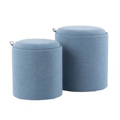 two blue round ottomans sitting next to each other