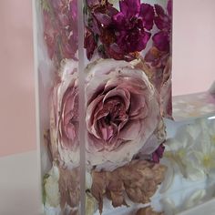 a vase filled with flowers on top of a table