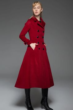 The long wool coat is made of 60% wool, others are polyester. it has a polyester lining. the winter coat is closed by front double buttons. Fitted style prefect show womens body curve. A great classic coat is essential to complete any fall or winter outfit and this wool red coat is just the one. The sleek and tailored look of this woman's coat will give you a polished but modern look at all times. This is a warm and comfortable coat that is just as functional as it is stylish. This classic coat Formal A-line Outerwear For Fall, Formal A-line Fall Outerwear, Long Red Outerwear For Work, Red Long Outerwear For Work, Formal A-line Wool Coat For Fall, Formal Wool A-line Outerwear, Long Red Outerwear With Buttons, Red Long Outerwear With Buttons, Red Double-breasted Wool Outerwear