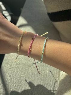 Thank you for clicking on this shop!  These bracelets are 18k plated so you can wear them anywhere!  They also are adjustable, so you can slip them on and off to your liking.  They are great for wearing alone or layering with other bracelets, like my bestselling WAX CORD BRACELET listed in my shop. if you have any questions at all, please message me and ill be happy to help! xx, bea INSTAGRAM:designedbybeaco TIKTOK:designedbybea EMAIL:designedbybeabusiness@gmail.com Trendy Gold Braided Bracelets As Gift, Trendy Gold Braided Bracelets For Gift, Trendy Gold Braided Bracelets Perfect For Gifts, Trendy Gold Beaded Braided Bracelets, Everyday Gold Beaded Braided Bracelets, Trendy Gold Braided Bracelet With Adjustable Length, Casual Handmade Gold Friendship Bracelets, Friendship Bracelets With Colorful Beads As Gift, Gold Friendship Bracelets With Colorful Beads As Gift