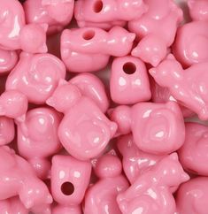 pink plastic beads with holes in the middle