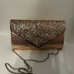 New Clutch With Chain Shoulder Strap. Rose Gold Clutch Bag As Gift, Rose Gold Clutch Bag For Gift, Rose Gold Clutch Bag For Evening, Chic Rose Gold Bag For Gift, Chic Rose Gold Bag As Gift, Rose Gold Clutch For Evening, Chic Rose Gold Bag For Events, Chic Rose Gold Event Bag, Chic Rose Gold Clutch Bag