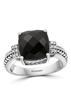 Glinting diamonds accent a sterling silver ring centered with a faceted onyx center stone. Total diamond weight: 0.06ct. Sterling silver/onyx/diamonds 
 Made in the USA Formal Black Rings With Gemstone Accents, Elegant Black Rings With Gemstone Accents, Black Diamond Ring With Diamond Accents In Sterling Silver, Black Rings With Gemstone Accents, Black Onyx Ring, Onyx Ring, Black Onyx, Sterling Silver Ring, Nordstrom Rack