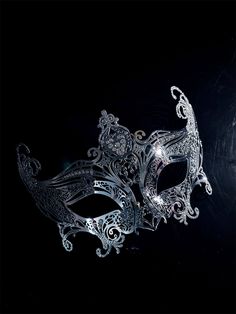 Step into the world of upscale glamour with our exquisite women's silver metal masquerade mask. The mask's silver shimmer adds an air of elegance, reflecting the light and adding a touch of enchantment to your appearance.

Age Group/Gender - Adult/Unisex

Size/Type - One size fits all adults

Mask Color - Silver

Shimmer Color - Silver

Mask Material - Lasercut Metal

Special Features - Rhinestones Masquarade Mask, Silver Masquerade Mask, Masquerade Mask Women, Silver Mask, Metal Mask, Party Masks, Masquerade Masks, Masks Masquerade, Type One