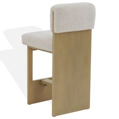 a wooden chair with a white upholstered seat and back rests against a white background