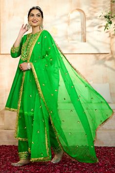 Green short anarkali with floral pattern gota embroidery. Comes with matching salwar and dupatta. - Aza Fashions Navratri Chinon Sets With Dupatta, Bollywood Style Chinon Sets For Diwali, Festive Georgette Churidar With Gota Work, Green Mulmul Palazzo Set With Zari Work, Anarkali Sets With Zari Work In Traditional Drape, Anarkali Kundan Sets With Zari Work, Festive Chanderi Dupatta With Dabka Work, Anarkali Sets In Chinon For Navratri, Bollywood Style Kundan Kurta With Traditional Drape