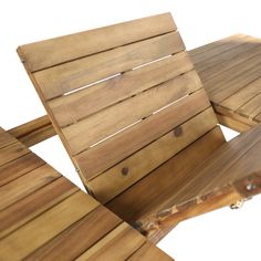 two wooden benches sitting next to each other