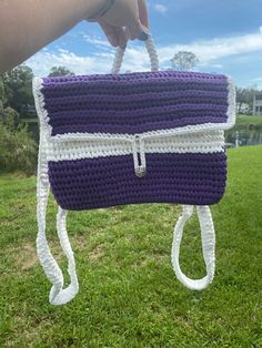 Handmade Crochet Bookbag backpack that converts into an over-the-shoulder messenger style bag. 12 1/2 x 10 inches. School Satchel With Laptop Sleeve Crossbody, Casual Rectangular Crochet Bag For School, Backpack Shoulder Bag With Laptop Sleeve For School, School Backpack Shoulder Bag With Laptop Sleeve, School Backpack With Laptop Sleeve, Casual Purple Satchel With Adjustable Strap, Everyday Handmade Shoulder Bag Backpack, Purple Satchel With Adjustable Strap For School, Adjustable Crossbody Shoulder Bag For School