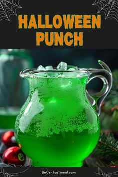 green liquid in a glass pitcher with the words halloween punch